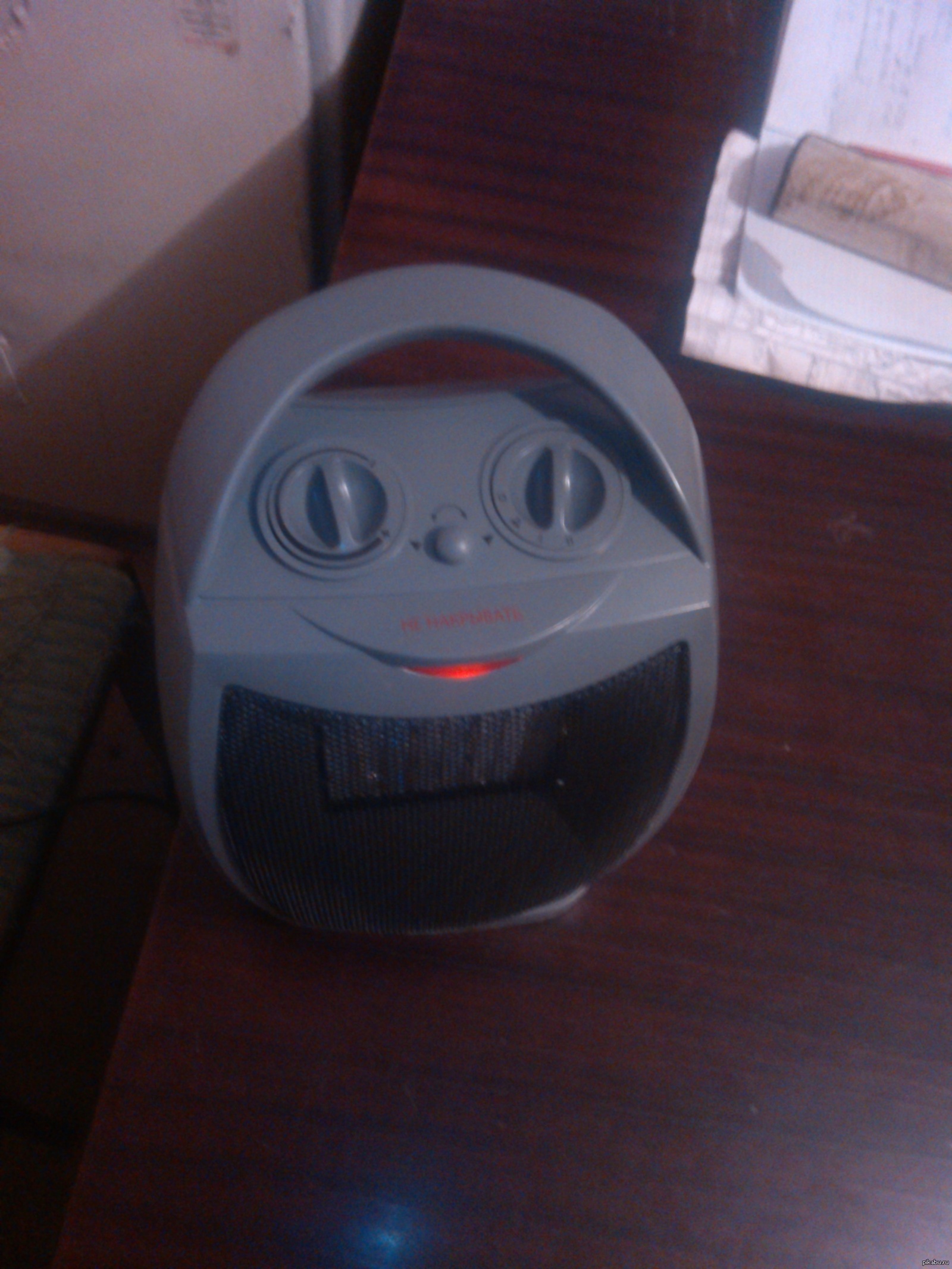 Обогреватель доволен новым рабочим местом.